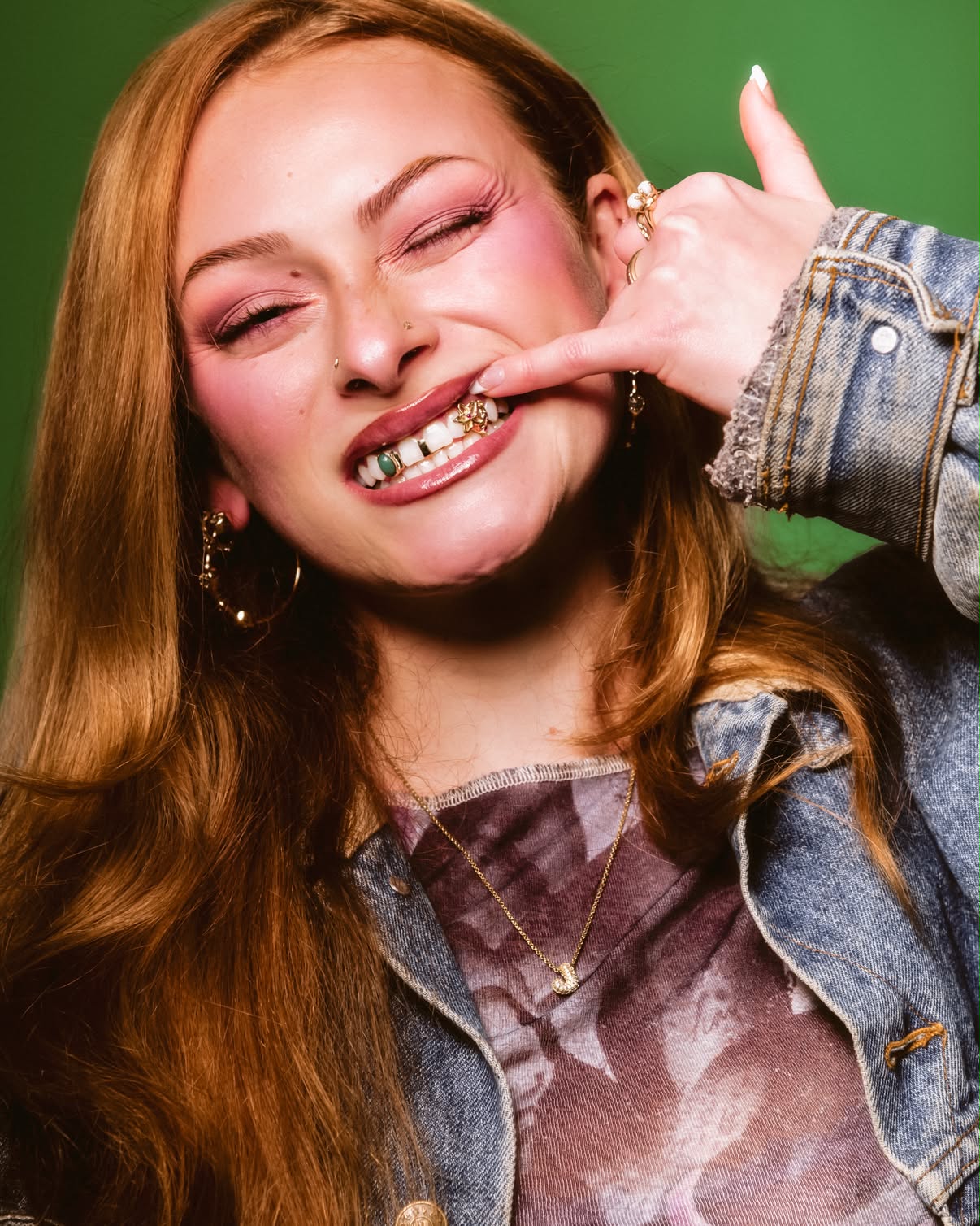 Client smiling with Glitz and Grillz work